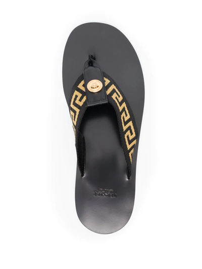 Shop Versace Greca Pattern Flip-flops In Black