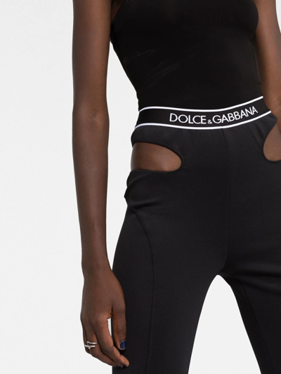 Shop Dolce & Gabbana Logo-waistband Cut-out Trousers In Schwarz