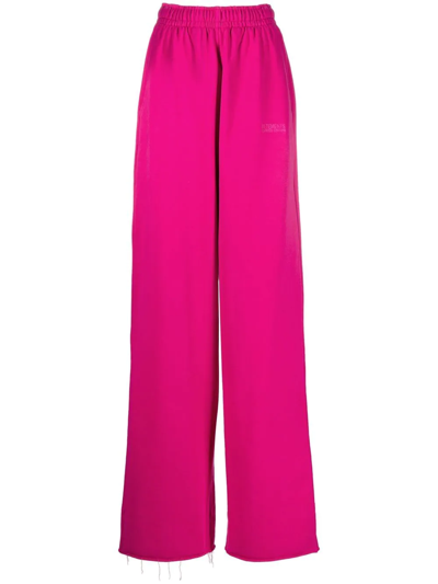 Shop Vetements Embroidered-logo Wide-leg Trousers In Rosa
