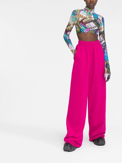 Shop Vetements Embroidered-logo Wide-leg Trousers In Rosa
