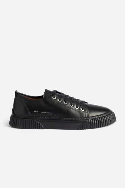 Shop Ami Alexandre Mattiussi Lace-up Low-top Logo Sneakers In Black