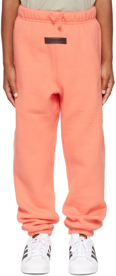 Shop Essentials Kids Pink Logo Lounge Pants In Coral