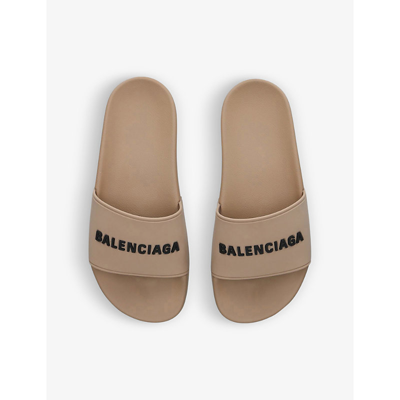 Shop Balenciaga Women's Beige Logo-embossed Rubber Slides