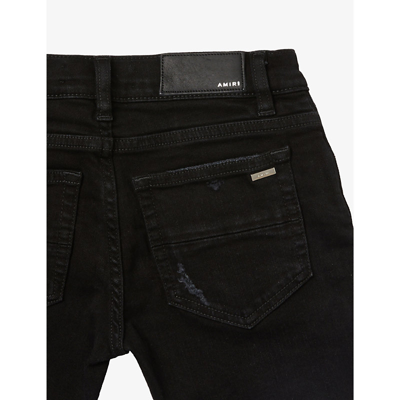 Shop Amiri Ripped Knee Brand-patch Stretch-denim Jeans 4-12 Years In Black
