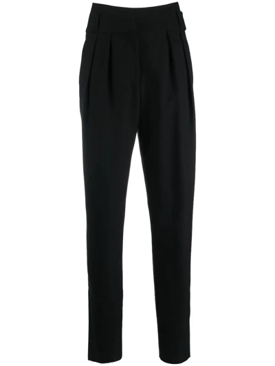 Shop Iro Pleated High-waisted Trousers In Black