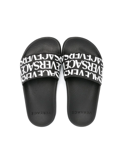 Shop Versace Logo-print Slides In Black