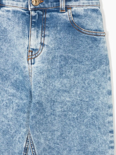 Shop Versace Wide-leg Denim Jeans In Blue