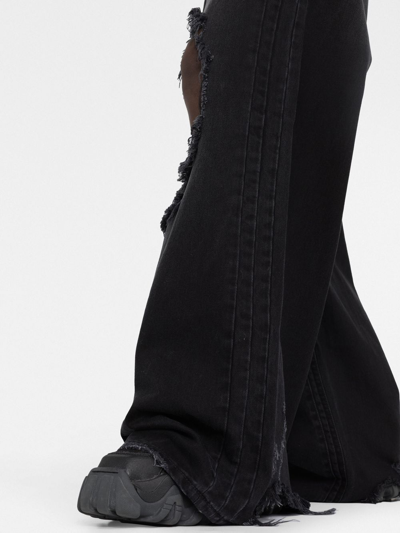 Shop Vetements Distressed Wide-leg Jeans In Black