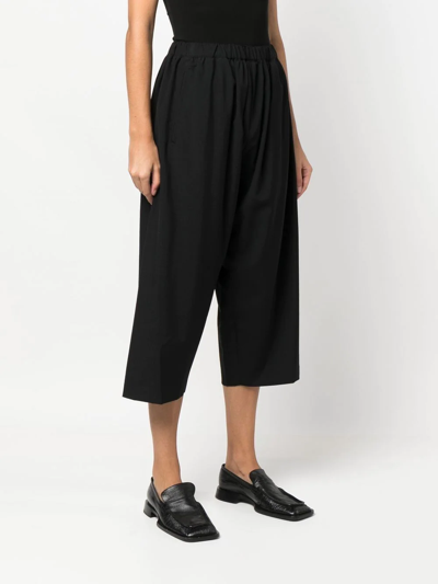 Shop Comme Des Garçons Cropped Elasticated Trousers In Black
