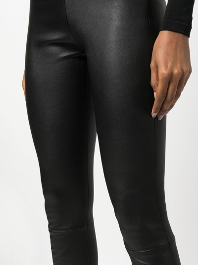 Shop Drome Skinny-cut Lambskin Trousers In Black
