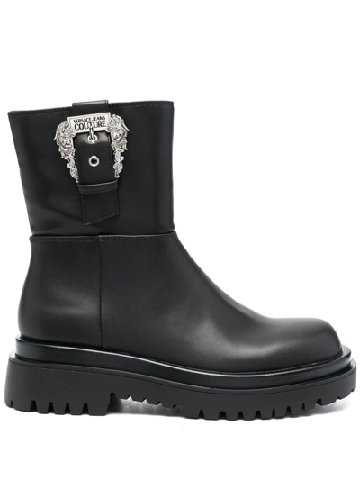 Shop Versace Jeans Couture Buckled Round-toe Low-heel Boots In Black