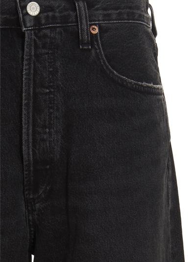 Shop Agolde Low Rise Baggy Jeans In Black