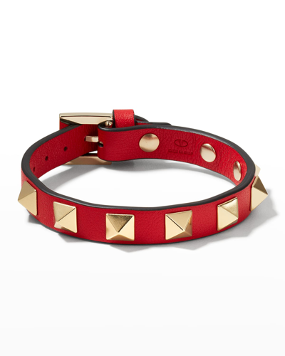Shop Valentino Rockstud Leather Buckle Bracelet In Rouge