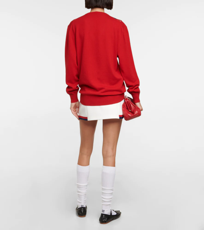 Shop Miu Miu Argyle Cashmere Sweater In Rosso