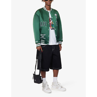 Shop Aape Brand-embroidered Striped-trim Oversized-fit Shell Jacket In Green
