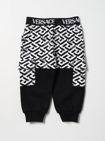 Shop Young Versace Pants  Kids Color White