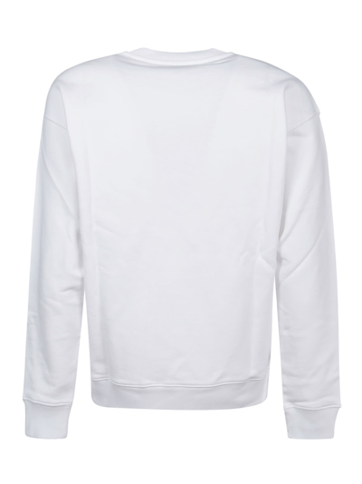 Shop Moschino Logo Printed Sweatshirt In Bianco Fantasia