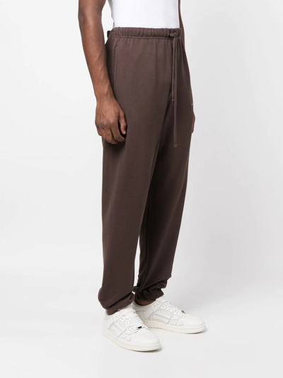 Shop Ih Nom Uh Nit Logo-print Detail Track Pants In Braun