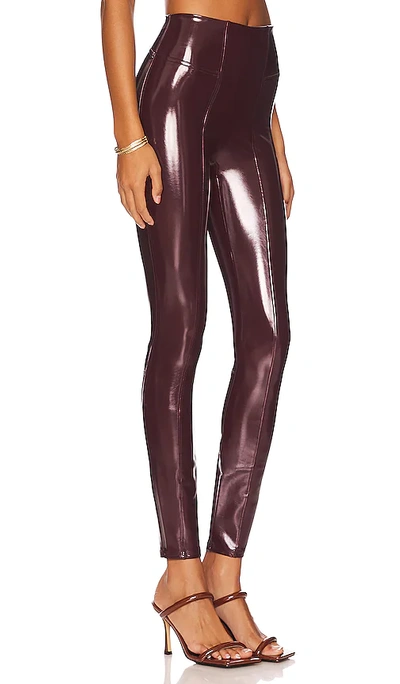 Shop Spanx Faux Patent Leather Leggings In Burgundy