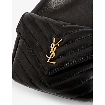 Shop Saint Laurent Monogram Mini Leather Bucket Bag In Black Gold