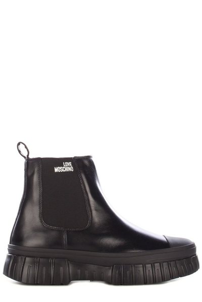 Shop Love Moschino Logo Printed Chunky Boots In Black