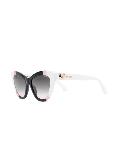 Shop Moschino Eyewear Panelled Cat-eye Sunglasses In White