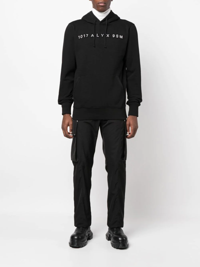 Alyx Studded-logo Detail Hoodie In Schwarz