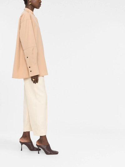 Shop Jil Sander Collarless Button-front Shirt In 褐色