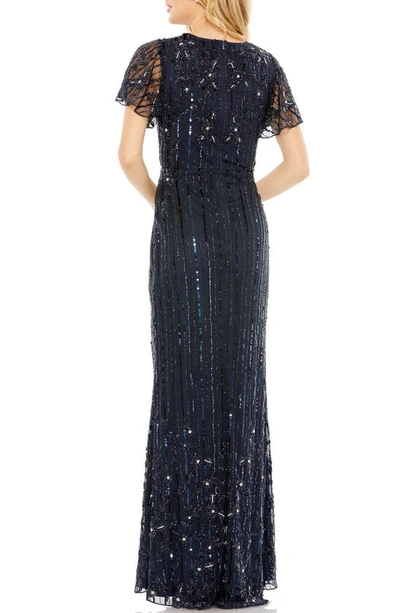 Shop Mac Duggal Bead & Sequin Wrap Front Tulle Sheath Gown In Midnight