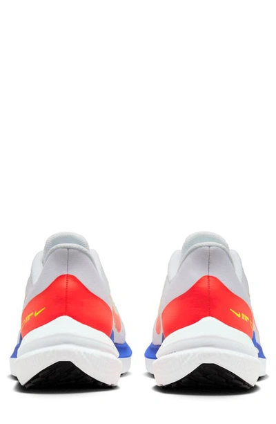 Shop Nike Air Winflo 9 Running Shoe In White/ Crimson/ Blue/ Volt