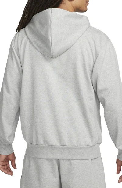 Shop Nike Dri-fit Standard Issue Hoodie Sweatshirt In Dark Grey Heather/ Pale Ivory