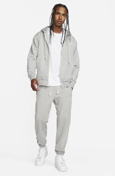 Shop Nike Dri-fit Standard Issue Full Zip Hoodie In Dark Grey Heather/ Pale Ivory