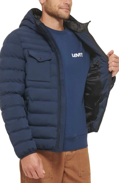 Shop Levi's Stretch Hooded Puffer Jacket In Navy