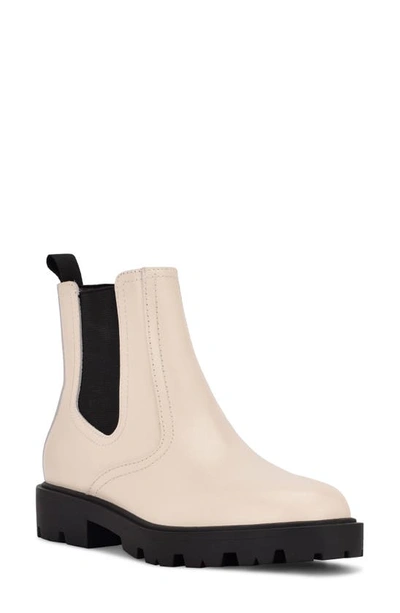 Shop Nine West Yeeps Chelsea Boot In Cream/ Black Leather