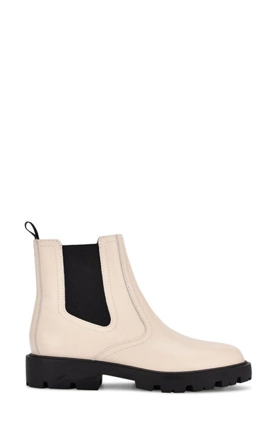 Shop Nine West Yeeps Chelsea Boot In Cream/ Black Leather