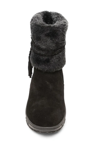 Shop Minnetonka Everett Water Resistant Faux Fur Boot In Black Solid