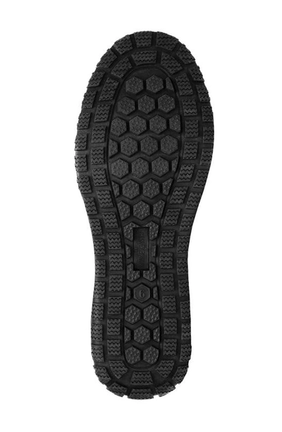Shop Minnetonka Everett Water Resistant Faux Fur Boot In Black Solid