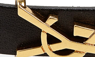 Shop Saint Laurent Ysl Insignia Leather Bracelet In Black/ Gold