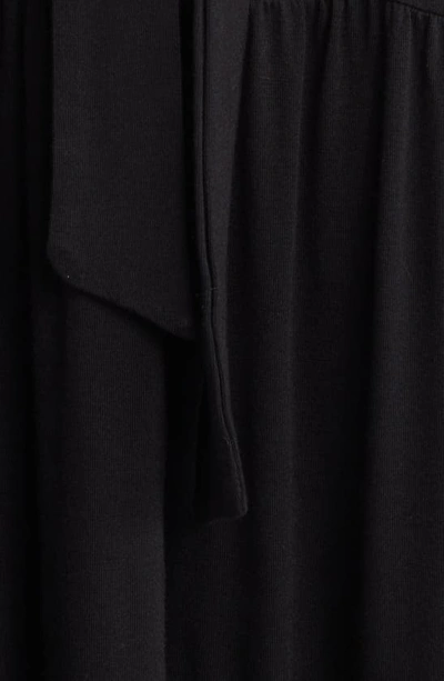 Shop Loveappella Tiered Halter Maxi Dress In Black