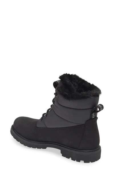 Shop Timberland Faux Fur Trim Puffer Waterproof Boot In Black