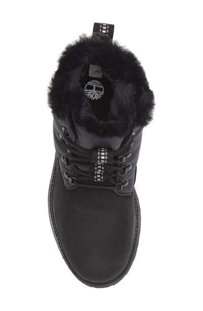 Shop Timberland Faux Fur Trim Puffer Waterproof Boot In Black