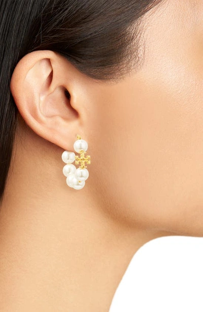 Shop Tory Burch Kira Imitation Pearl Hoop Earrings In Rolled Brass 59 / Ivory