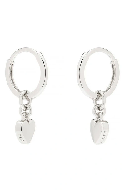 Shop Ted Baker Sweetheart Tiny Heart Huggie Drop Earrings In Silver Tone