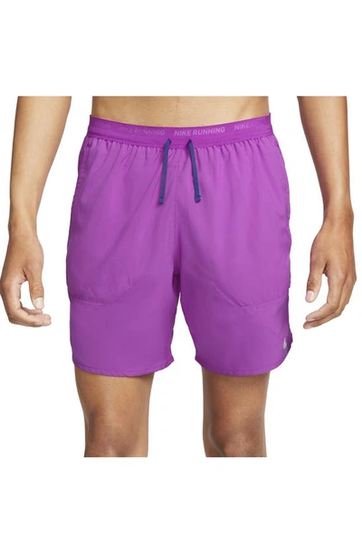 Shop Nike Dri-fit Stride 7-inch Brief-lined Running Shorts In Vivid Purple/ Deep Royal Blue