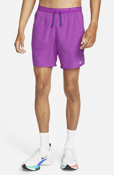 Shop Nike Dri-fit Stride 7-inch Brief-lined Running Shorts In Vivid Purple/ Deep Royal Blue