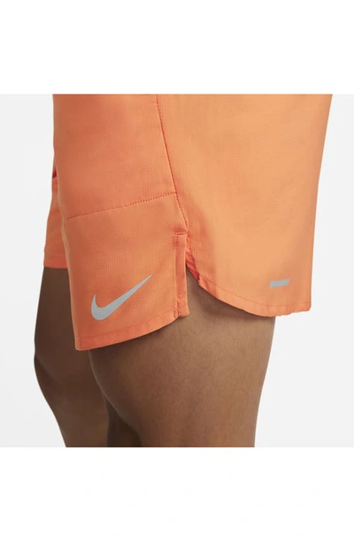 Shop Nike Dri-fit Stride 7-inch Brief-lined Running Shorts In Orange Trance/particle Grey