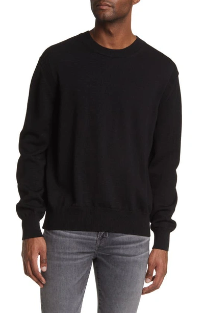 Shop Frame Oversize Merino Wool Sweater In Noir