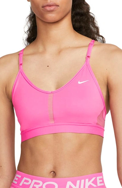 Shop Nike Indy Mesh Inset Sports Bra In Pinksicle/ Desert Berry