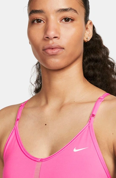 Shop Nike Indy Mesh Inset Sports Bra In Pinksicle/ Desert Berry