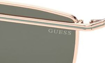 Shop Guess 63mm Half Moon Sunglasses In Shiny Rose Gold / Green